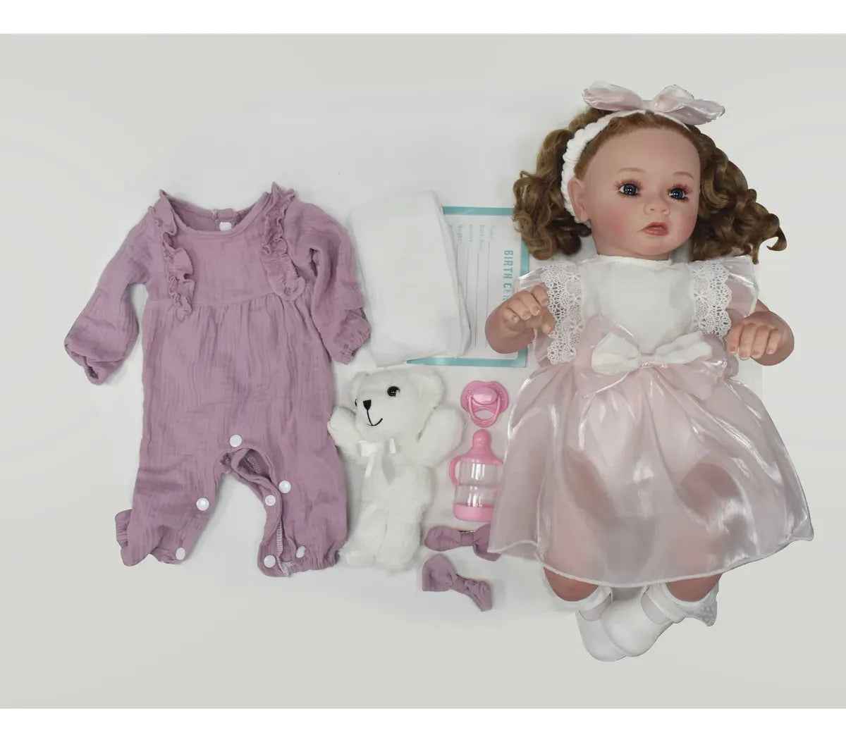 Muñeca Newborn 55 cm Realista con Cabello y Accesorios S43540