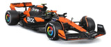 Bburago 1:24 McLaren MCL38 w/helmet, PIASTRI 18-28033